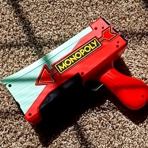 Monopoly money gun